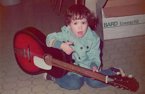 Little Joey playing guitar